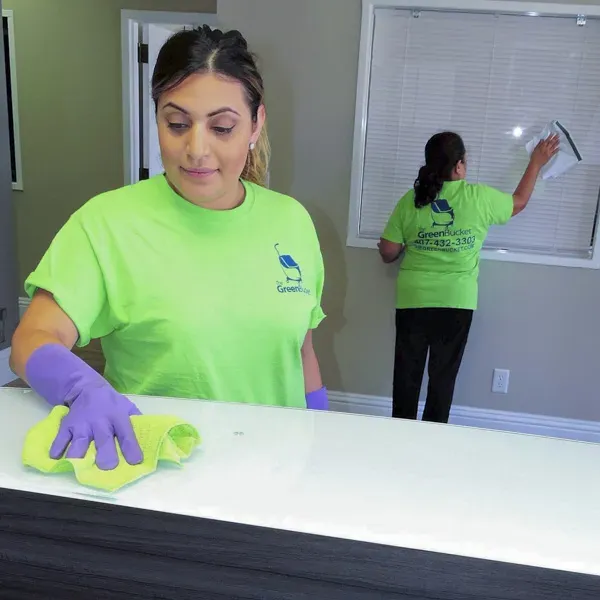 Healthcare cleaning staff implementing essential cleaning protocols in a medical facility